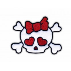 Skull with red bow