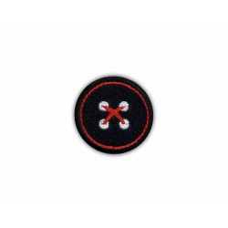 Black button with red thread